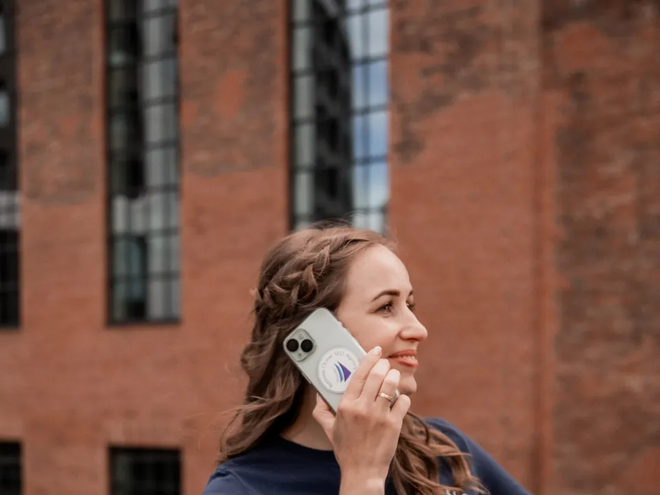 Taking a client call — branded phone case and all